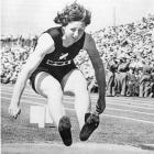 Yvette Williams wins the long jump at the 1954 Commonwealth Games in Vancouver. Photo from <i>ODT...