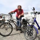 Zim Sherman, of Oamaru,  with two of his electric bikes. Photo by Rebecca Ryan.