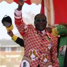 Zimbabwe President Robert Mugabe waves to supporters during an election rally last Thursday....