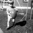 A 3-year-old  Michael ‘‘Woody’’ Woodhouse playing in the back yard of his family home in...