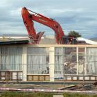 An excavator demolishes the former Dunthat Motel and St Luke’s Hospital building in South Dunedin...