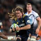 Dan Pryor carries the ball for the Highlanders. Photo: Getty Images