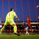 Divock Origi scores the first goal for Liverpool. Photo: Reuters