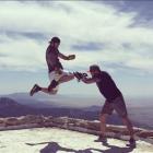 Dunedin MMA fighter Brogan Anderson flies into a bag held by MMA fighter Frank Lester, from...