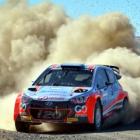 Hayden Paddon and co-driver John Kennard power around a corner on Lee Flat Rd during stage 14 of...
