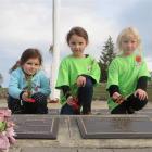 Iconz 4 Girlz members from left Willow Johnson (4), Bella Johnson (6) and Charli Boyle (6) place...