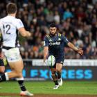 Lima Sopoaga looks to kick during the Highlanders' loss to the Sharks. Photo: Getty Images