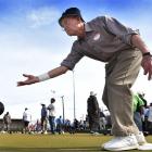 Otago Boys’ High School old boy Murray Wyatt (82), of Dunedin delivers a bowl in the fours during...