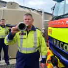 Outram fire brigade  firefighter Craig Brown (left) and station officer Kevin Brady with a tank...