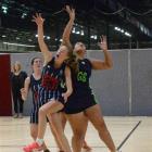 St Hilda’s Senior A goal keep Mara McCurdy and College A goal shoot Isabella Masani battle for...