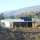 The house of Bill Nagle and Corinne Ebisu is nestled above Clyde. Photos by Pam Jones.