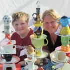Debbie Beatson, of Wingatui, and her son Daniel (10) display their colourful garden totems at the...