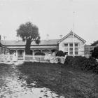 Oamaru Public Hospital in 1908. At left was the lecture room; the entrance and office were...