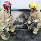 Alexandra Volunteer Fire Brigade station officer Doug McLellan (left) and firefighter Mark Briggs...