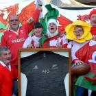 All Blacks supporter Maurie Alderslade (sitting, second from left) with his Cardiff friends (from...