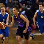 Aparahama Cooper (16), of Northland is chased by Top Of The South's Monty Fiddymont (left, 16)...