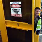 Farra Engineering manager Mark Stuart with a lockable lift hoarding cover. Photo by Gregor...