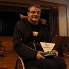 Kaitangata man Dallas Storer holds the Sport Maker Award he was presented with on Sunday to...