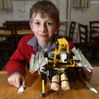 Balmacewen Intermediate pupil Aaron Nelson with his robot RATS, which can automatically set the...