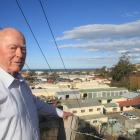Dennis Norman overlooks the main zone substation in Chelmer St that supplies power to about three...
