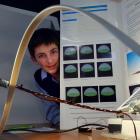 Taieri College pupil Adam Scammell watches his solar power experiment in action at the Aurora...