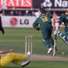South African batsman Allan Donald (No 10) sprints for the crease in vain after he and team-mate...