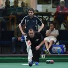 Southland’s Shane Elliott delivers a bowl while his opponent Andy McLean looks on at the PBA...