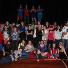 About 30 years 7 and 8 pupils crowded together at a Superhero-themed disco party organised by the...