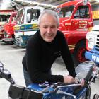 Classic Motorcycle Mecca curator Dave Roberts, at Bill Richardson Transport World with a 1970s...