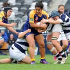 Otago Spirit first five-eighth Victoria Nafatali attacks the Auckland defence at Forsyth Barr...