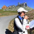 A volunteer at the Millbrook Resort golf course during this year's New Zealand Open. PHOTO:...