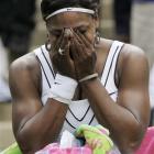 Serena Williams of the US reacts after defeating France's Aravane Rezai in their first-round...