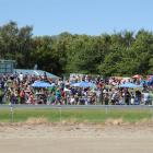 The crowd enjoys the sunshine at a previous Omakau trots. Photo by ODT.
