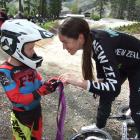 Keen Mosgiel BMX rider Cody Heger (5)  admires Sarah Walker’s Olympic silver BMX medal. Photos:...