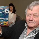 Abbeyfield Antiques Roadshow master of ceremonies Dougal Stevenson (right) shows an example of...