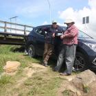 Would-be-rescuer and concerned dad Michael Buchanan (left) and whitebait fan John McKeown at the...