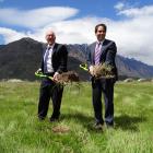 Queenstown Lakes Mayor Jim Boult (left) and Minister of Transport Simon Bridges turn the first...