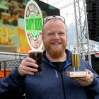 Dunedin brewer Saul Ross celebrates after winning the Dunedin Craft Beer and Food Festival...