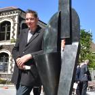 Palmerston North artist Dr Paul Dibble with one of the five bronze sculptures in his artwork...