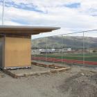 Unsettled weather and the availability of contractors means artificial turf at the Wanaka...