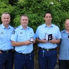 New Police Southern District Commander Inspector Paul Basham (left) presented long service awards...