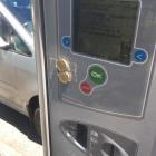 Someone yesterday generously taped two $1 coins to a parking machine. PHOTO: TONY MCCABE