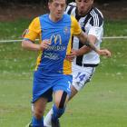 Southern United striker Andy Mulligan controls the ball as Hawke’s Bay United’s Martin Canales...