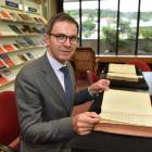 The Polish ambassador to New Zealand, Zbigniew Gniatkowski, reads 238-year-old book Observations...