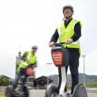 Dunedin Segway Tours co-managing directors Dereck Gray (foreground) and Dave Roberts ride Segways...