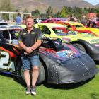 Central Motor Speedway promoter Graham Williamson with a line of super saloon cars in Cromwell....