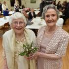 Flower girls Chris Elder (left) and Nancy Maxwell before the wedding of their grandchildren in...