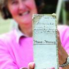 Edith Cromie, of Waihao Downs, displays the 153-year-old declaration of title to the brig Grecian...