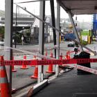 Emergency tape surrounds the front of a shop in Port Chalmers yesterday. PHOTO: STEPHEN JAQUIERY