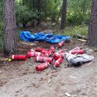 Fire extinguishers used to fight a forest fire near Queenstown’s Matakauri Lodge on Saturday....